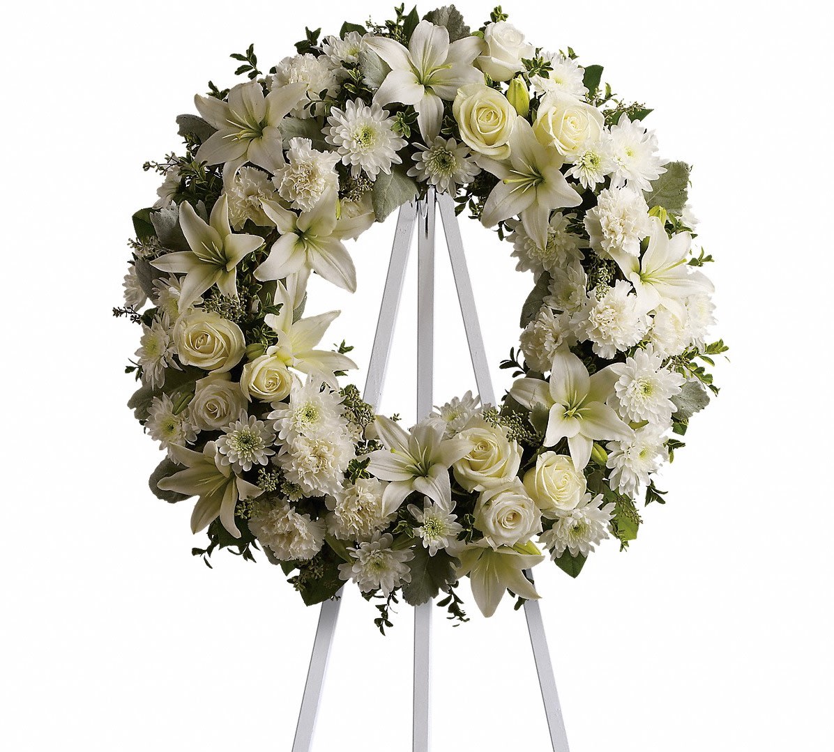 Serenity Wreath - A ring of fragrant, bright white blossoms will create a serene display at any funeral or wake. This classic wreath is delivered on an easel, and is a thoughtful expression of sympathy and admiration. Approx. 22 W x 22 H