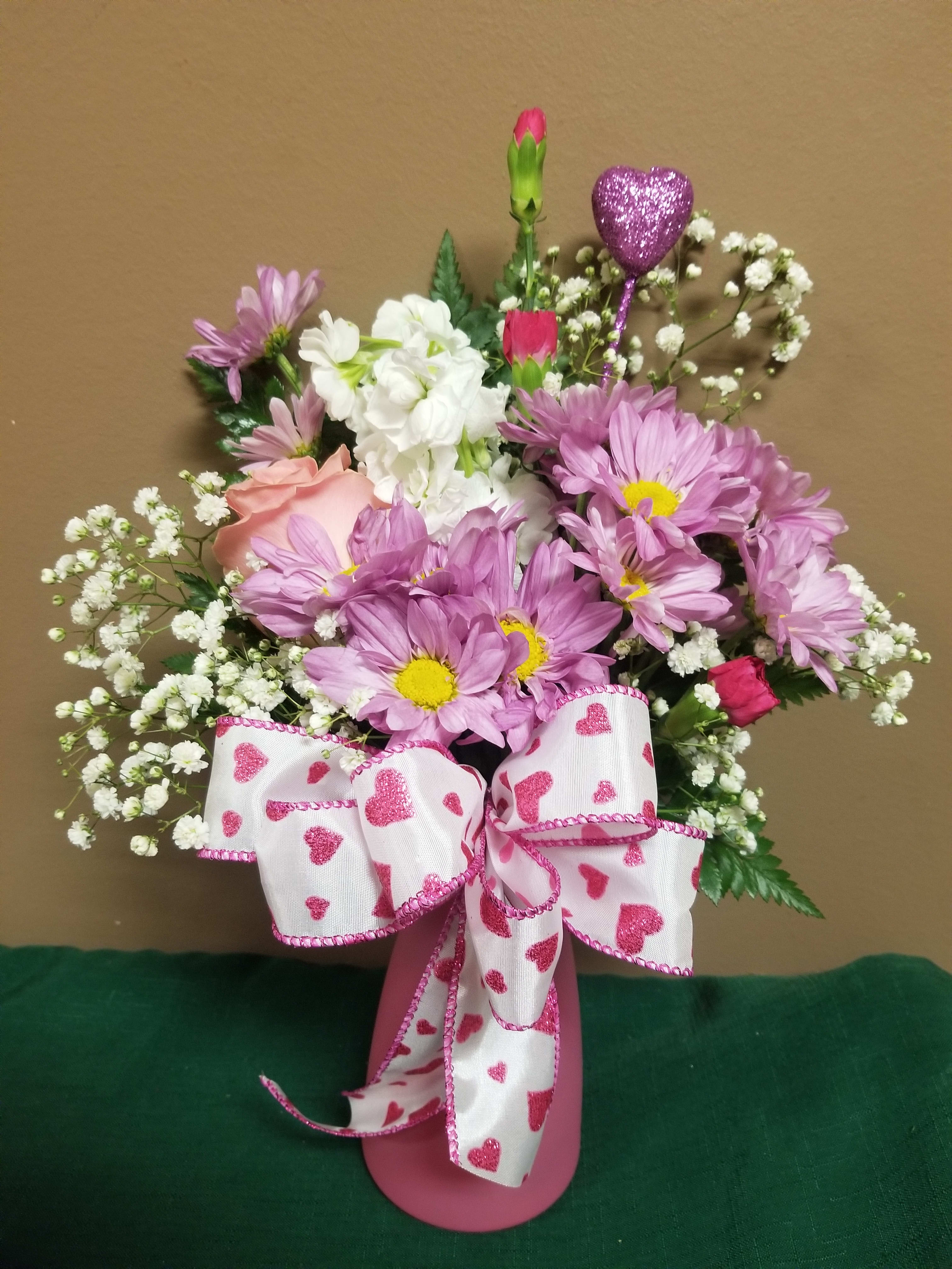 2021 valentine Special 2021 valentine Special - A small arrangement to let someone know they are loved this Valentines day! This arrangement contains daisy's, stock, mini carnations, rose, and others.