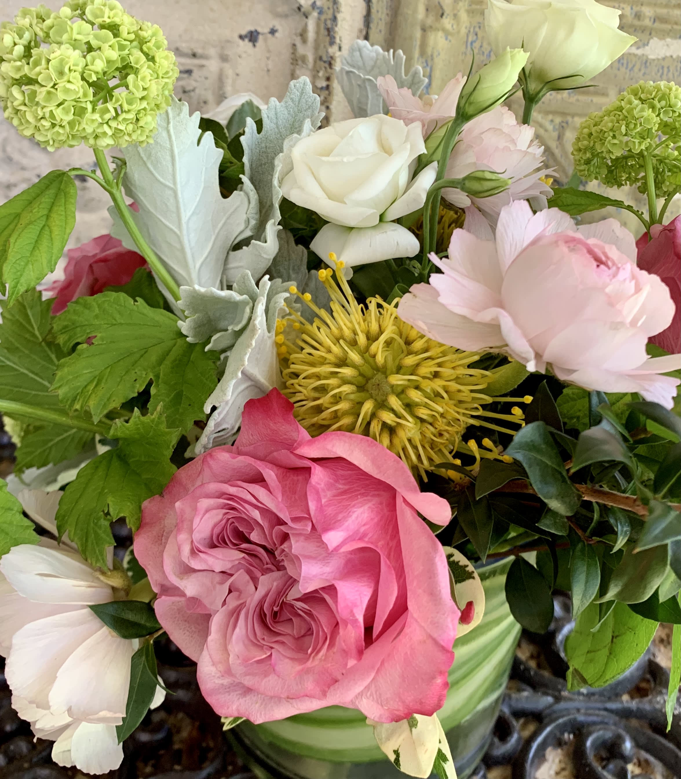 Prince Prince - Garden roses, peonies, viburnum, saracena, dusty miller, and assorted greenery.