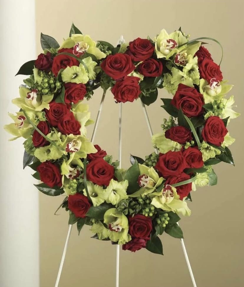 Rose Garden Spray Rose Garden Spray - In the shape of a heart, this garden of delicate blooms is a tender and classic tribute to a precious life, and a cherished expression of love and sympathy.