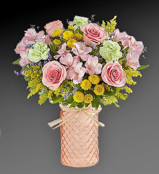 Tranquility Blooms Tranquility Blooms - A gift of fresh flowers can bring peace and comfort to the people we love during a difficult time. Our gathering of blooms in soothing shades of pink, yellow, purple and green arrives in our peach quartz mason jar, creating a warm reminder that brighter days are ahead.
