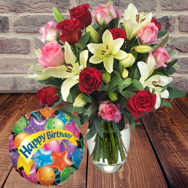 BIRTHDAY QUEEN  - Perfect combination of roses and lilies that are sure to impress the birthday girl (Mylar Balloon included) 6 red roses 6 light pink roses plus white Asiatic Lilies and greenery, become an excellent gift option