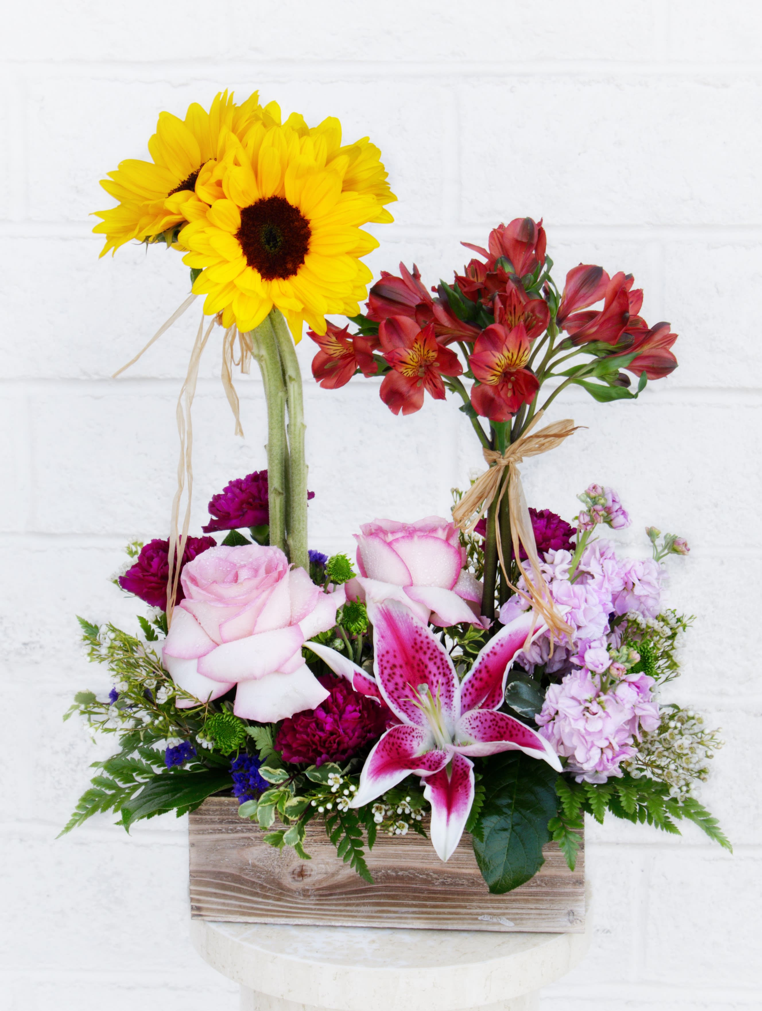 Sunny Botanical - Littte garden including sunflower, lily, rose, fragrant stock, astroemeria and accents in a wood box.