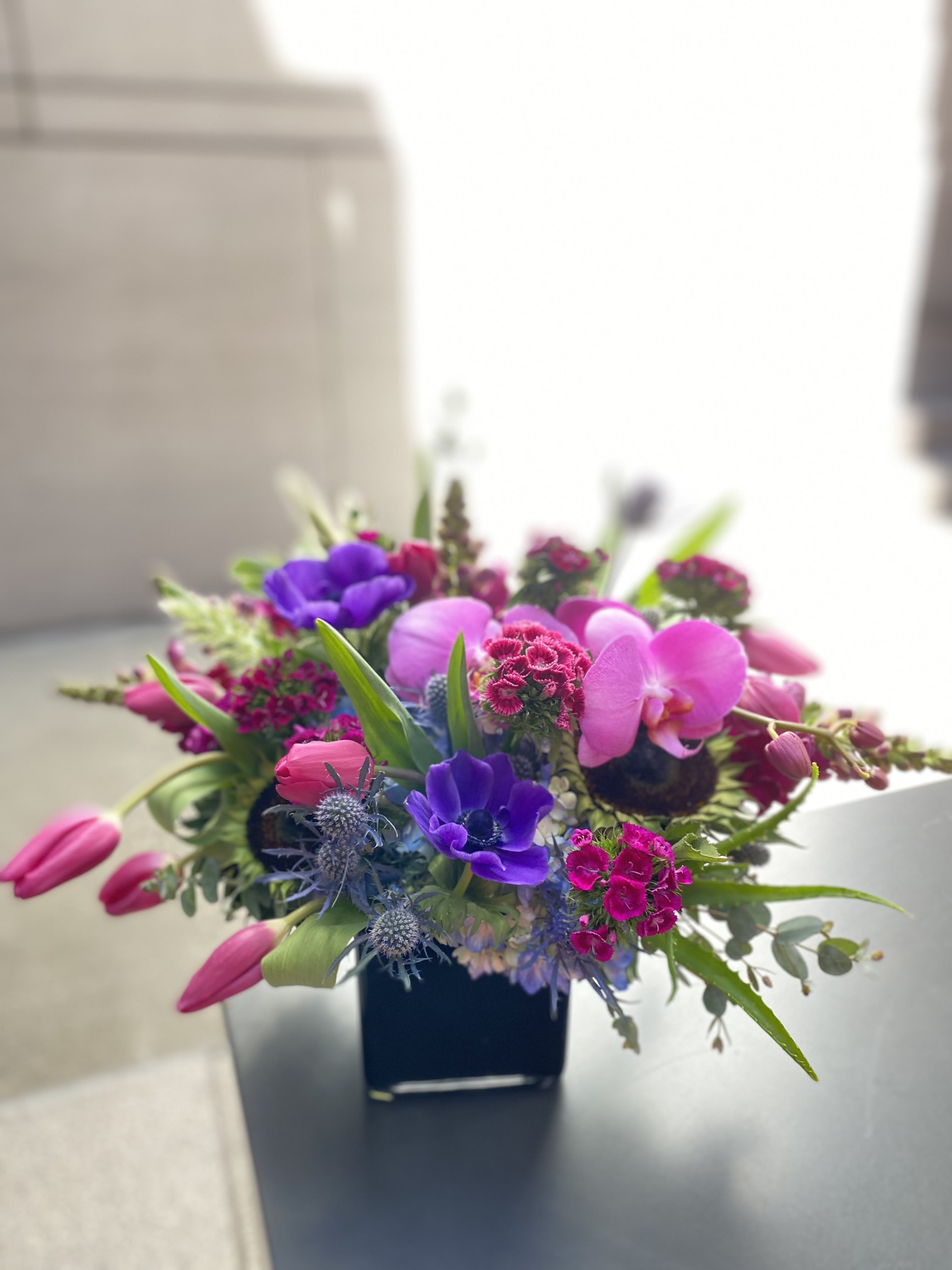 Mixed luxury seasonal flowers in purple in San Francisco, CA Urban