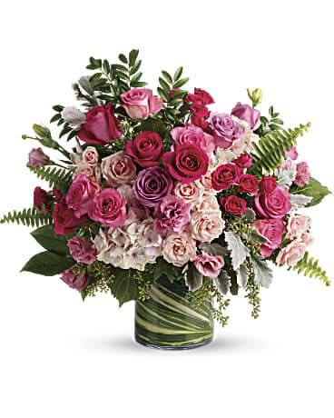 Haute Pink Bouquet - A high-fashion fantasy of roses! When you want to make a grand statement, send this dreamy bouquet of posh pink roses and modern greens.  This gorgeous bouquet includes light pink hydrangea, hot pink roses, lavender roses, pink roses, hot pink spray roses, light pink spray roses, pink lisianthus, dusty miller, huckleberry, sword fern, seeded eucalyptus, lemon leaf, and variegated aspidistra leaves. Delivered in a large glass cylinder vase.  SUBSTITUTION POLICY – Always deliver the freshest flowers! Please note the bouquet pictured reflects our original design.  If the exact flowers or container in this arrangement are not available, we will create a beautiful bouquet with the freshest available flowers.