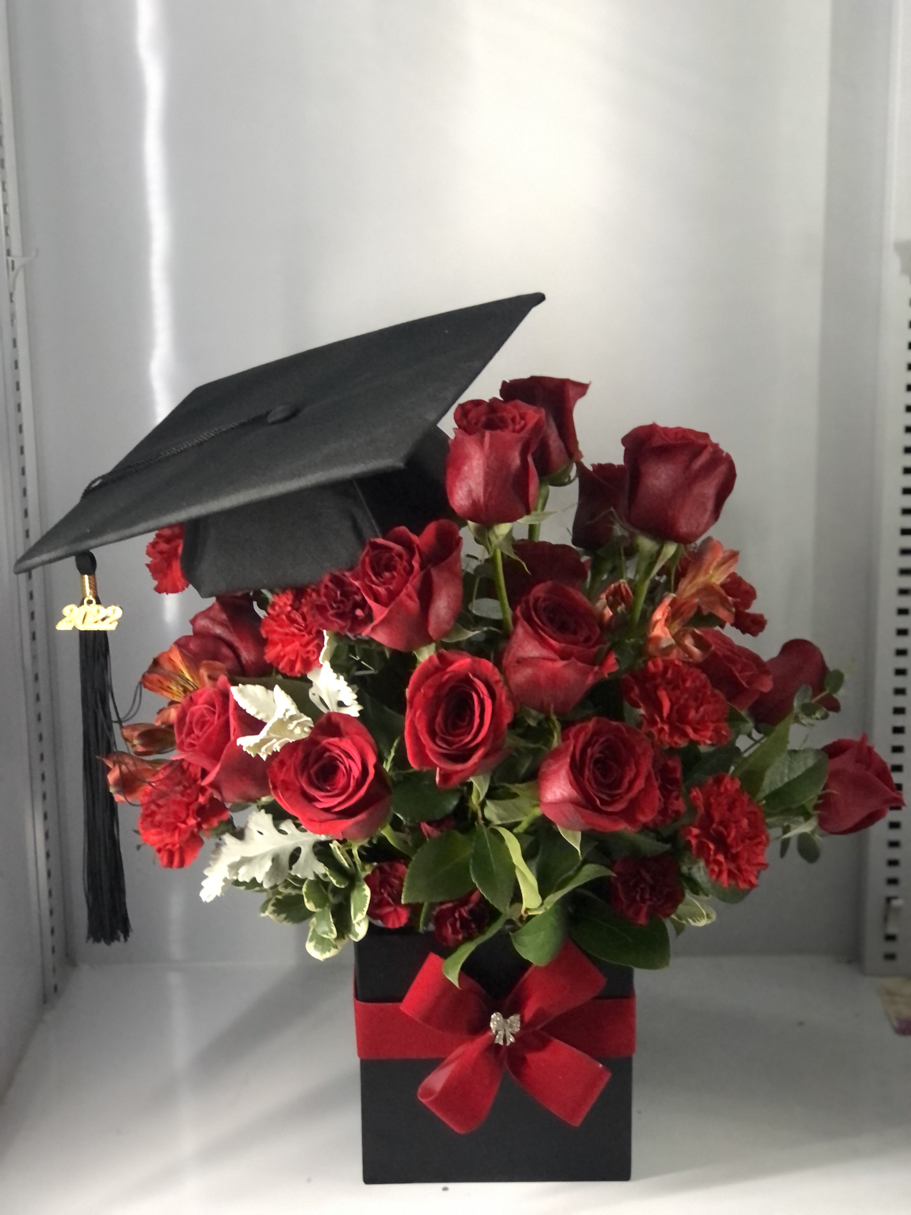 All red blooms - Beautiful Graduation arrangement ,  color can be substituted 