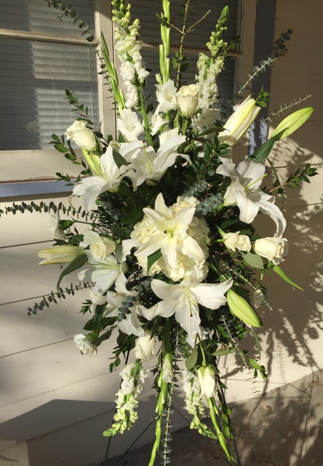 White Elegance Tribute White Elegance Tribute - Easle of all white Snapdragons, Gladiolus, Lilies, Roses,