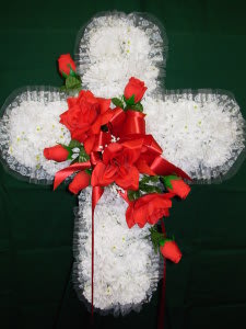 SILK-PERMANENT CROSS - MEDIUM  NEW-S08 - Our MEDIUM  SILK CROSS is made of quality SILK-PERMANENT white carnations with a spray of red roses and ribbon cascading down through the arms of the cross and comes on a tall easel stand.  The cross itself is 24&quot; tall and is 20&quot; wide and stand a total of 56&quot; tall on the easel.  OUR SILK AND PERMANENT FLOWERS  are an economical alternative to live fresh flowers and are also great for those LAST MINUTE FUNERAL ORDERS when there is not enough time to create a fresh floral design.   MOST ALL of our local cemeteries allow silk and permanent flowers to remain on the grave for some months and are a very practical option during the freezing winter months or the extremely hot summer months in our area.  