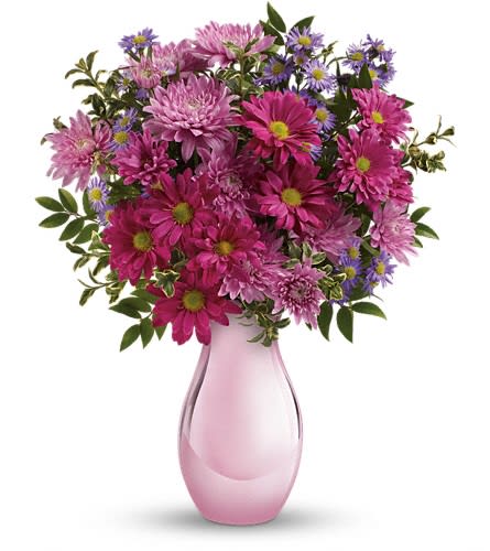 Teleflora's Time Together Bouquet - Simply sweet this charming bouquet of asters and chrysanthemums is accented with a shimmering pink keepsake vase she'll always treasure. Purple monte cassino asters lavender cushion chrysanthemums and pink daisy chrysanthemums are arranged with huckleberry and oregonia. Delivered in a beautiful Pink Reflections vase.Approximately 13 3/4&quot; W x 17 1/4&quot; H Orientation: One-Sided As Shown : TEV34-1ADeluxe : TEV34-1BPremium : TEV34-1C