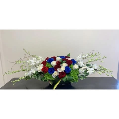 Patriotic Vase  - Order this unique arrangement at Kenneth Village flowers to celebrate US national holidays. We proudly serve our customers for 21 years and are one of the most well-known flower shops in Glendale, CA. 