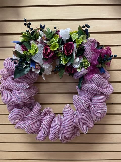 Fushia/Pink and Green Silk Wreath - Pink and white mesh wreath with blue, green, and fuchsia silk flowers