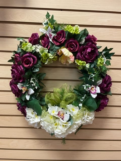 Mauve and Green Silk Grapevine Wreath Mauve and Green Silk Grapevine Wreath - Grapevine wreath with silk green, mauve, and white flowers