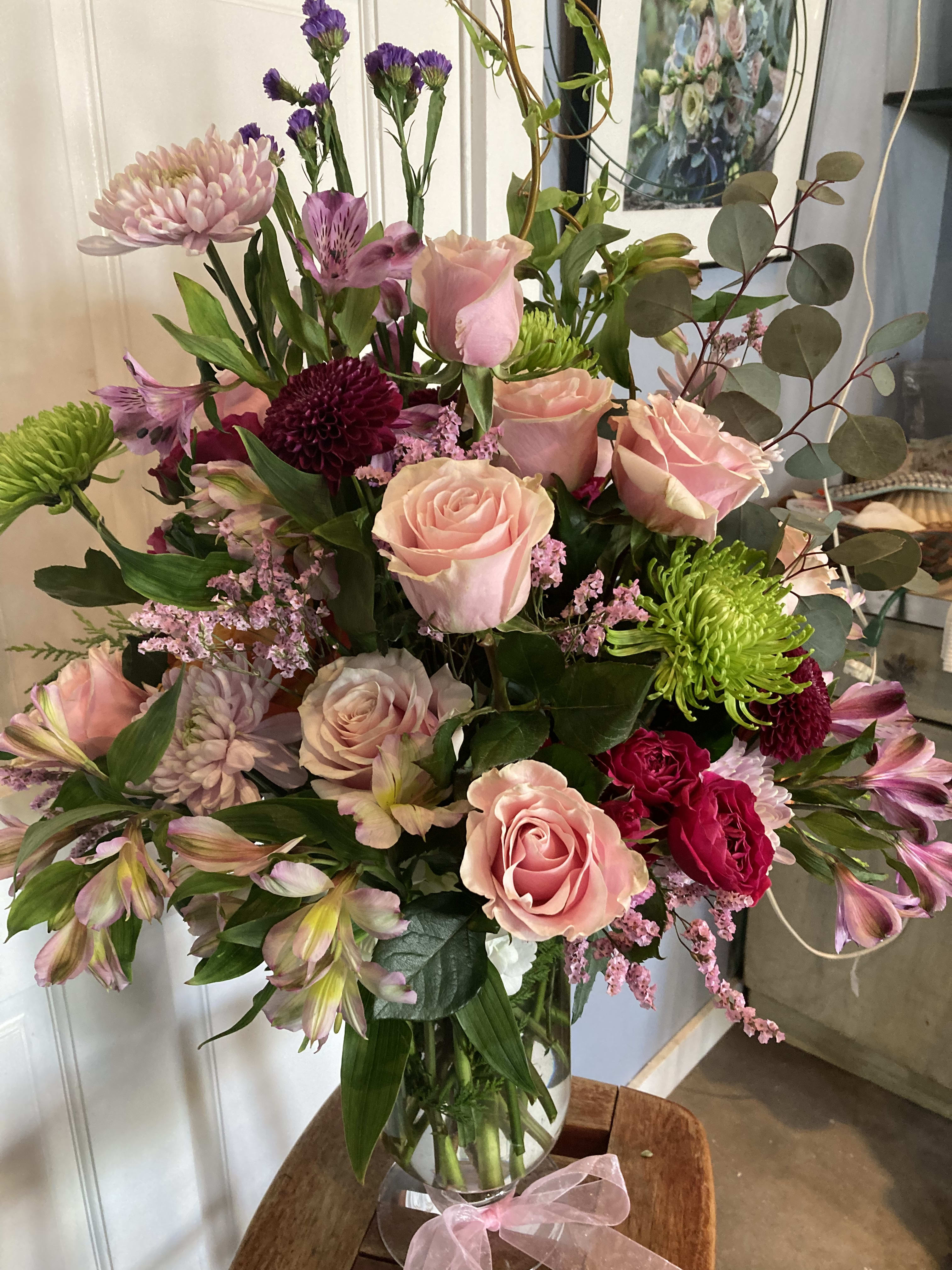 Roses galore  - Beautiful rose arrangement, any colors that are available, with gorgeous composition touches to make this arrangement a stunning piece for any occasion, please order ahead!