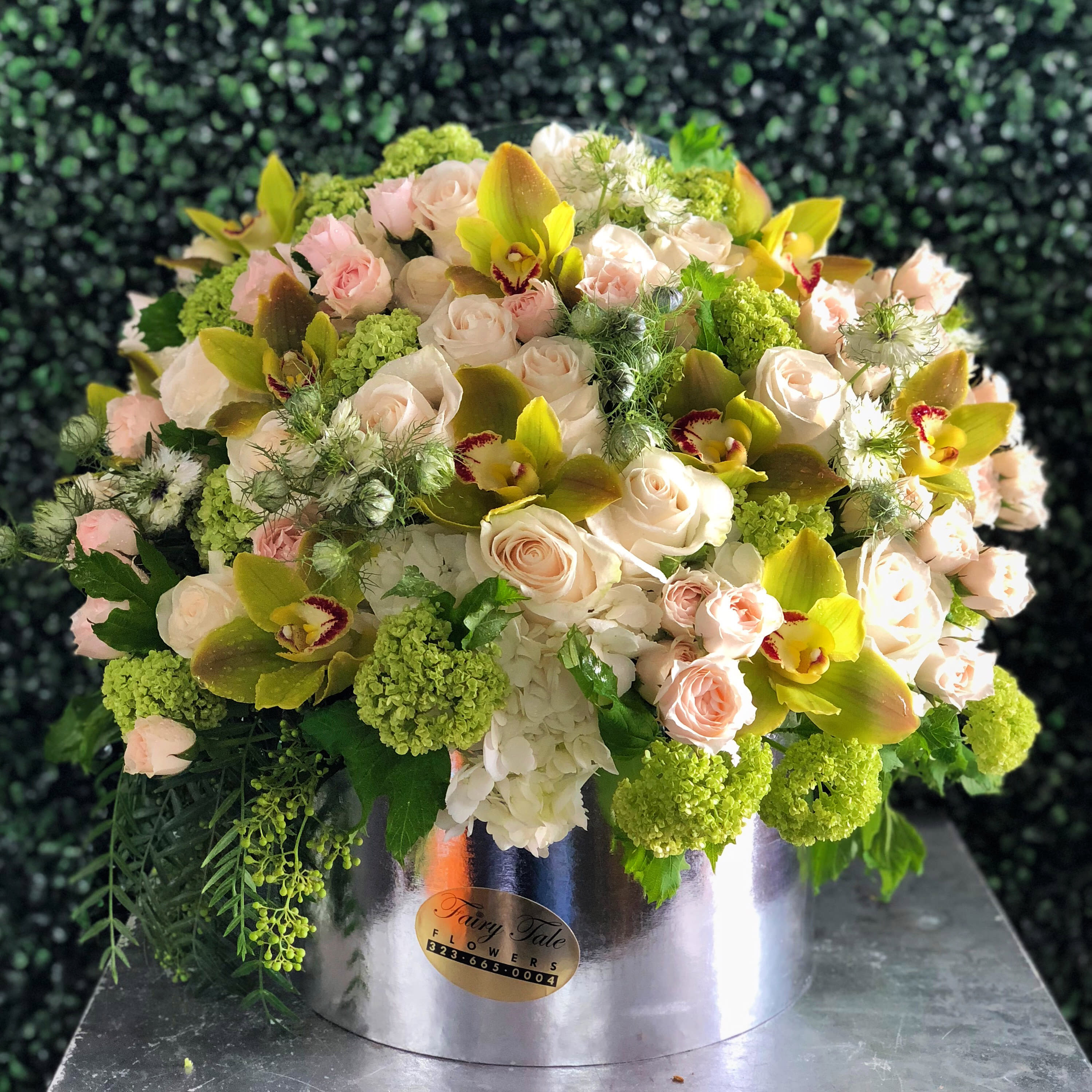 Garden Beauty - Mix arrangement of roses, green orchids, hydrangeas, and spray roses