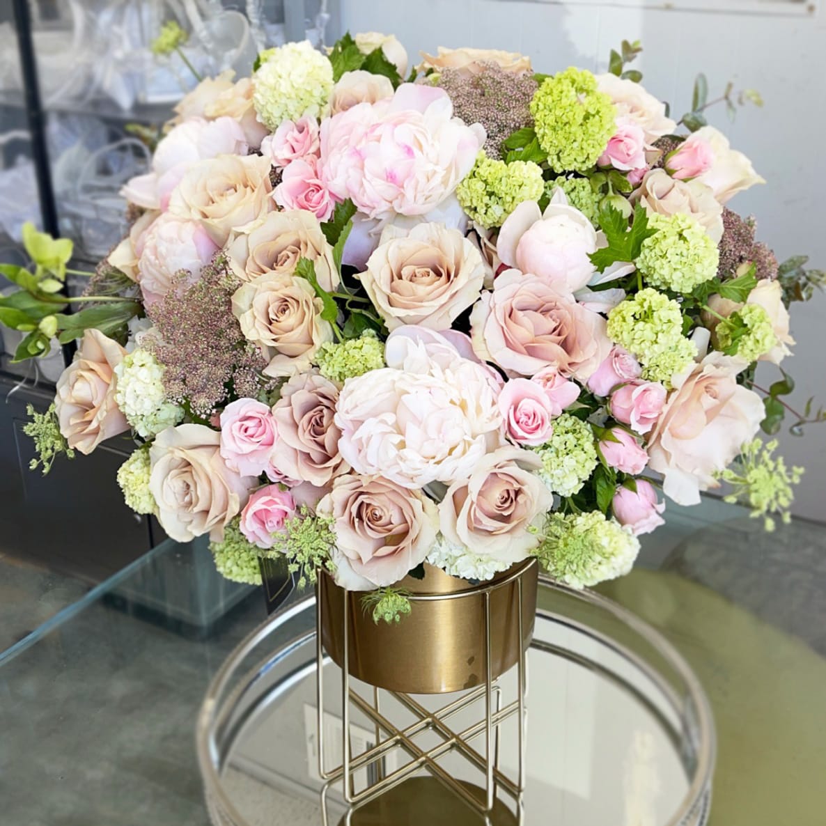 Elegant Bloom Elegant Bloom - Mixed flower arrangement with blush roses, peonies, and vibernum