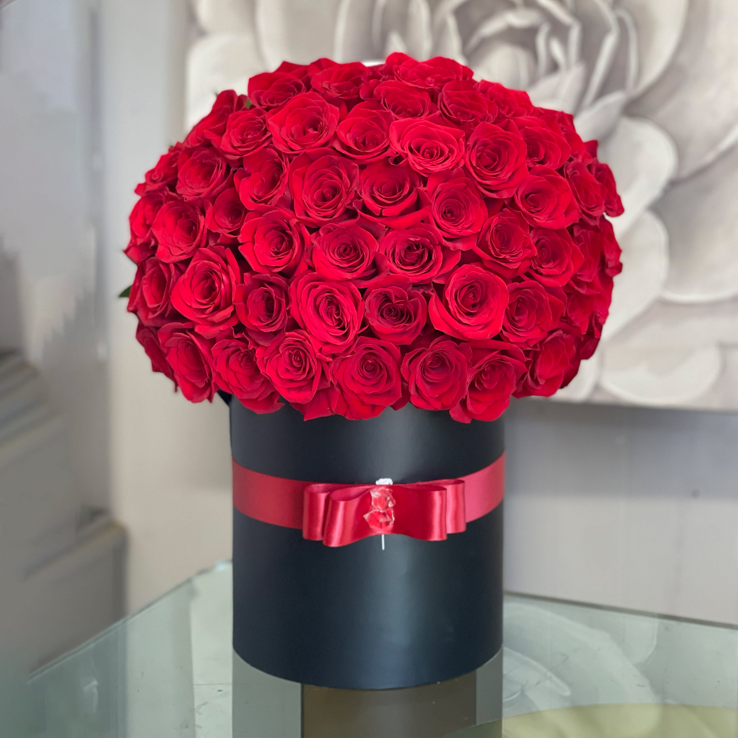 Love Me Passionately  - Round Box arrangement with gorgeous red roses 