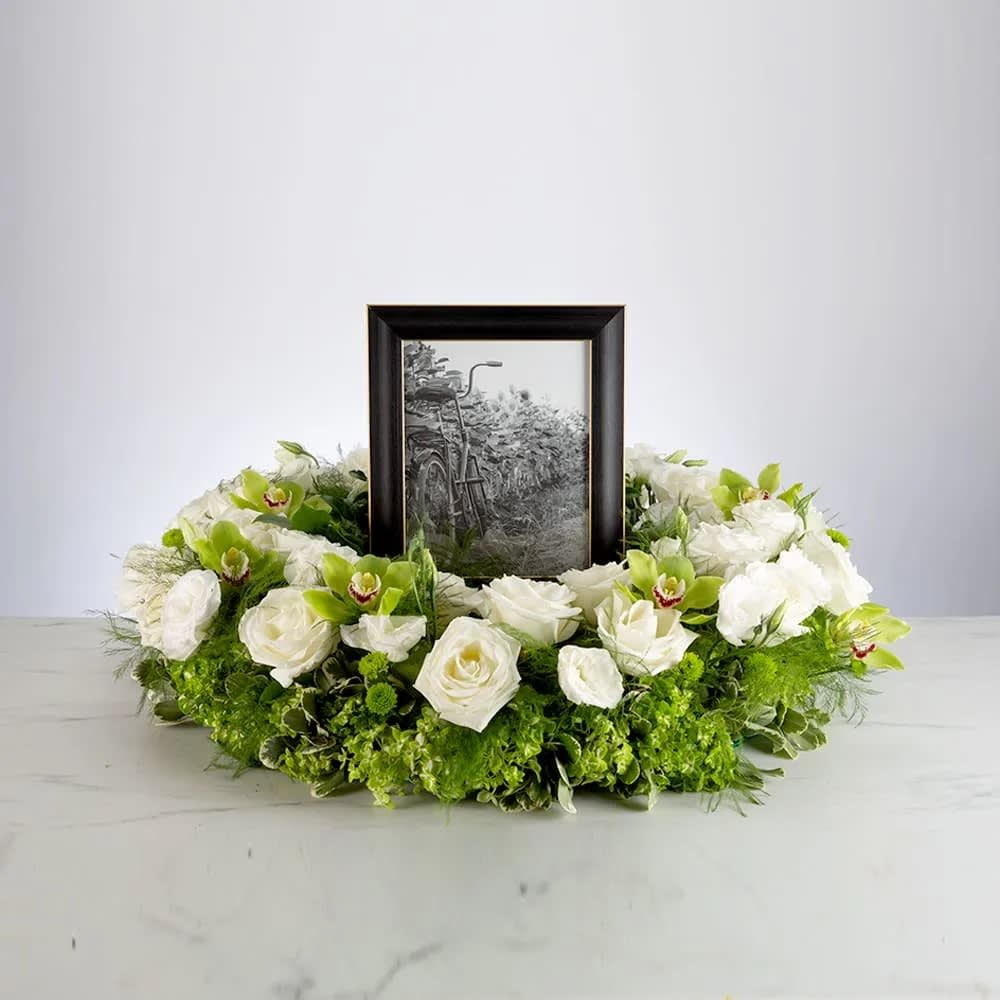 Beautiful Memories - A beautiful tribute piece and a way to frame a wonderful memory. Honor the memories by surrounding them in blooms.  Frame not included. 