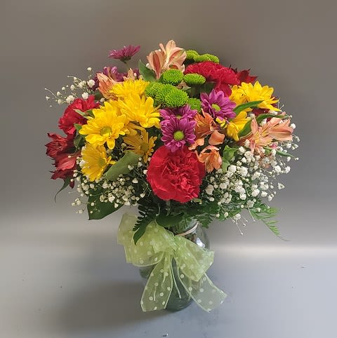 Color Me Bright and Happy  - A bright, cheerful combination of daisies, alstromeria, and mini carnations. Colors may vary.