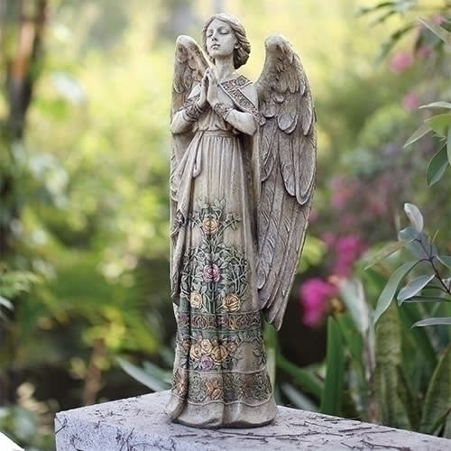 Roman Praying Angel Garden - Resin 23&quot; x 9&quot; Angel is embossed with beautiful and colorful floral design on the front of her dress.