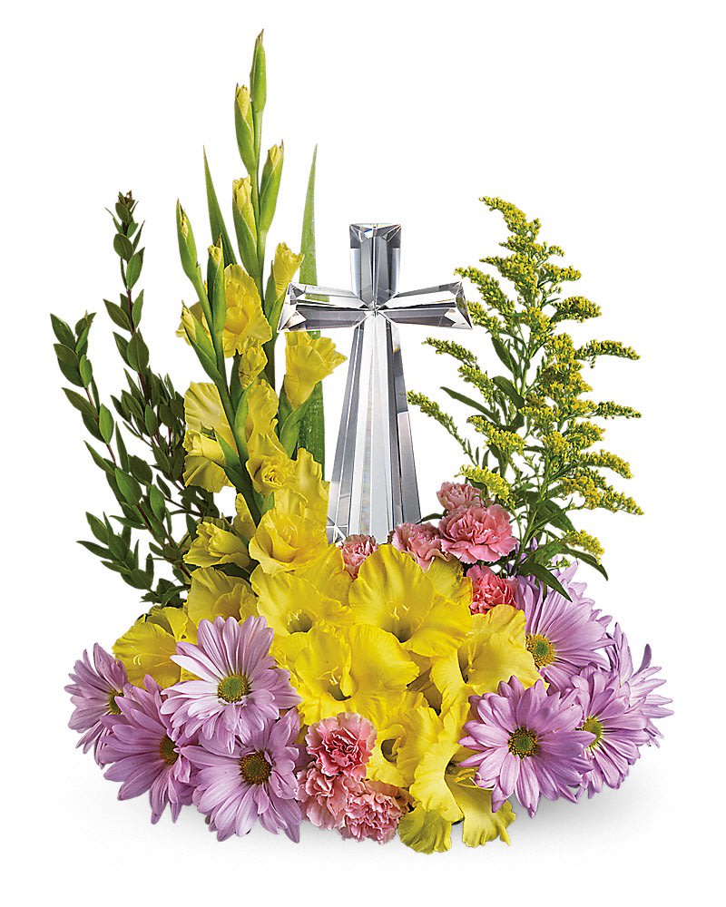 Teleflora's Crystal Cross Bouquet - Celebrate the reason for the season with radiant flowers cradling an exquisitely crafted Crystal Cross. This lovely gift will be a source of inspiration for years to come. Yellow gladioli, lavender daisy spray chrysanthemums, pink carnations and solidago accented with assorted greenery are delivered with a 7 Â½&quot; high, multifaceted Crystal Cross.