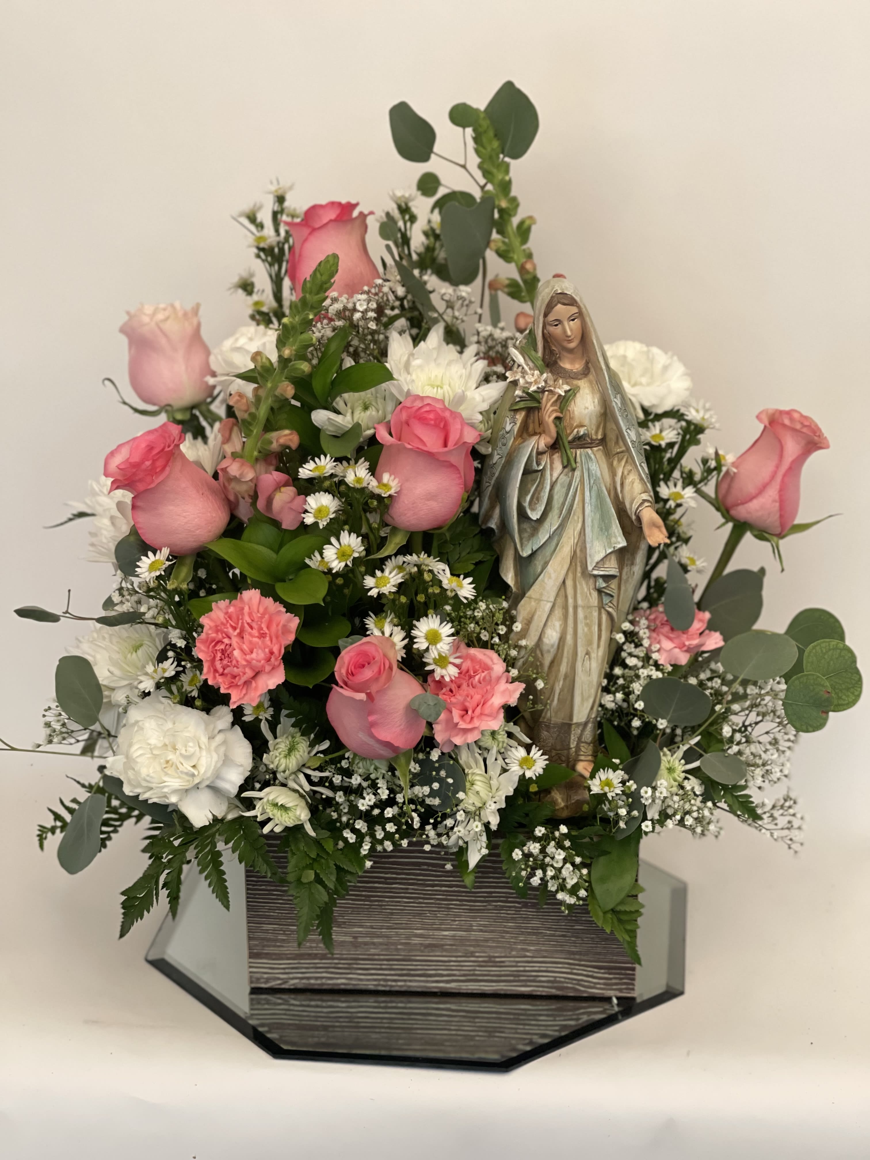 Mary with flowers - Wooden sculpture of Mary is a keeper 