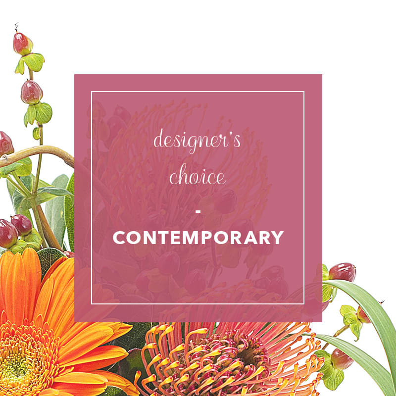 Designer's Choice - Contemporary - Let our designers create a beautiful arrangement with the freshest blooms of the season! The style of this arrangement will be contemporary.