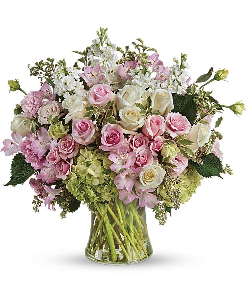Beautiful Love Bouquet - Simply beautiful, just like your love! Celebrate your feelings with this extraordinary bouquet of pink and white roses, accented with delicate greens and arranged in a graceful glass vase. This breathtaking bouquet features green hydrangea, pink roses, white roses, pink spray roses, light pink alstroemeria, pink lisianthus, white stock, pitta negra, and seeded eucalyptus. Delivered in a large gathering vase.