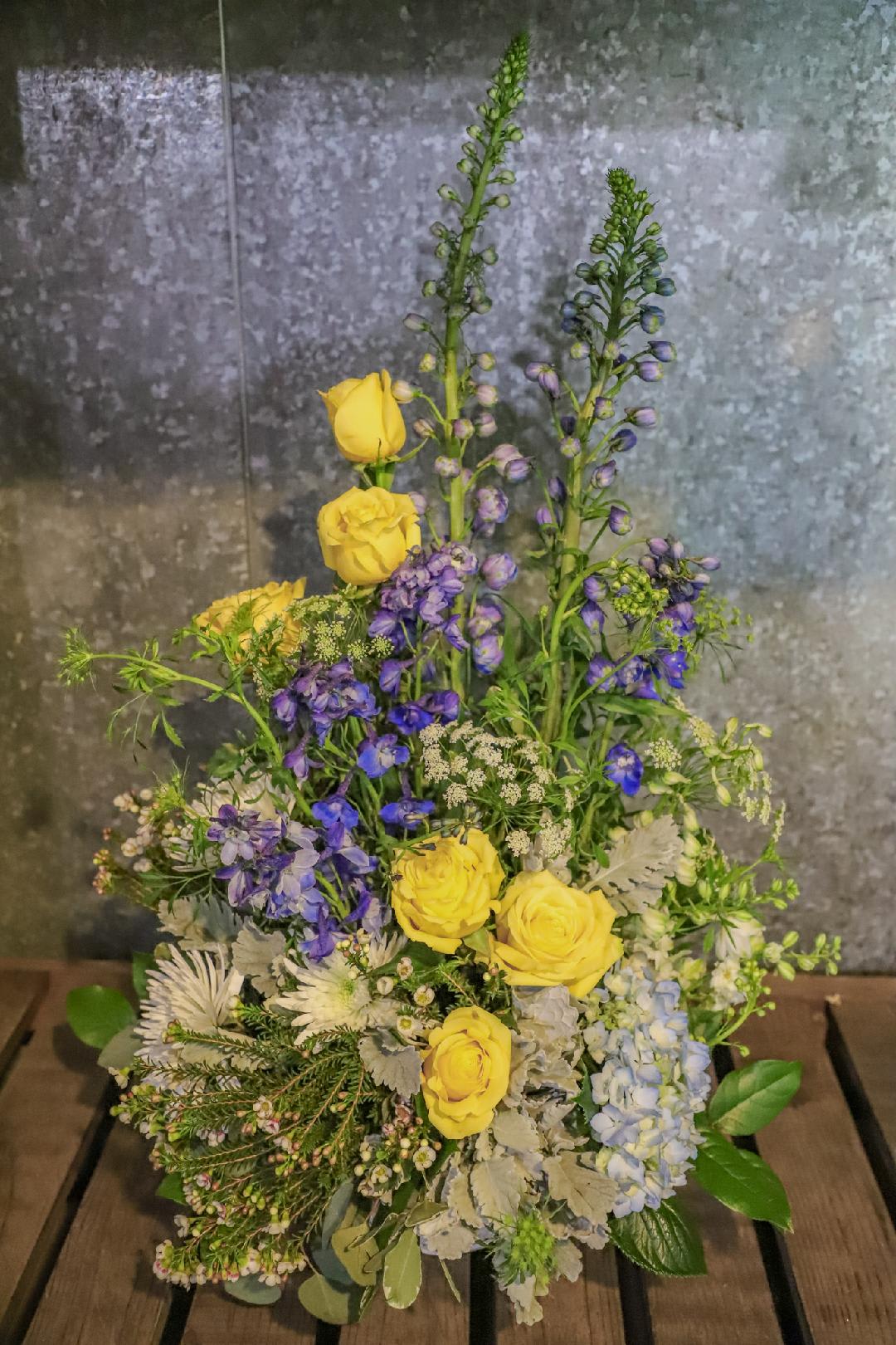 Light and Breezy Light and Breezy - Yellow, blue, and white, a classic combination that can express so many emotions; birthday, mother's day, thinking of you, I care.
