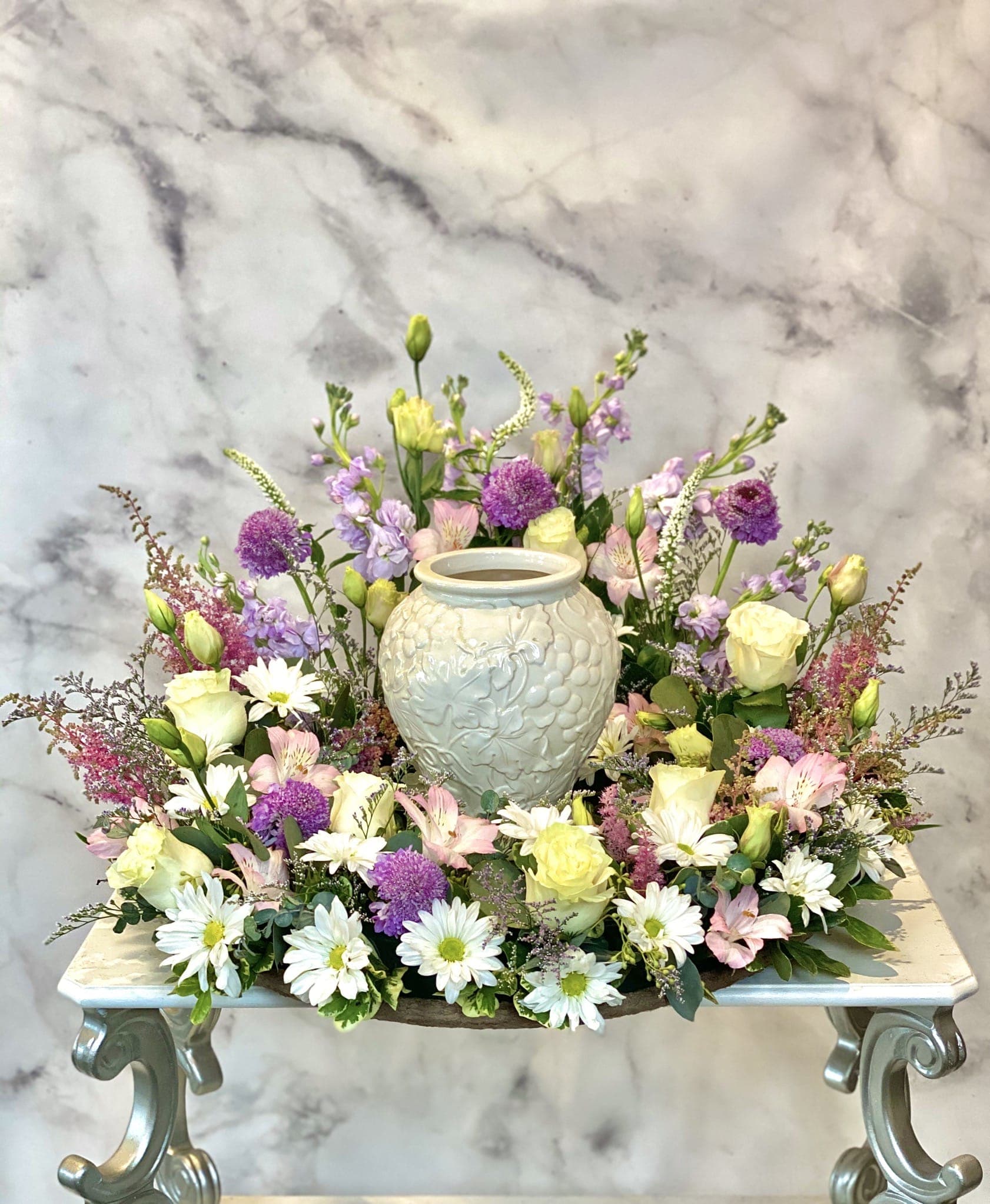 Urn flower hot sale arrangements