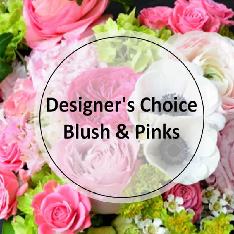 Premium - Designer's Choice - Blush &amp; Pinks - A stunning mix of blush, pink with touches of white novelty flowers. The types of premium  flowers used will vary based on the time of season and availability of specific flowers and greens.. Let our designers create a special and unique arrangement that goes above and beyond! 