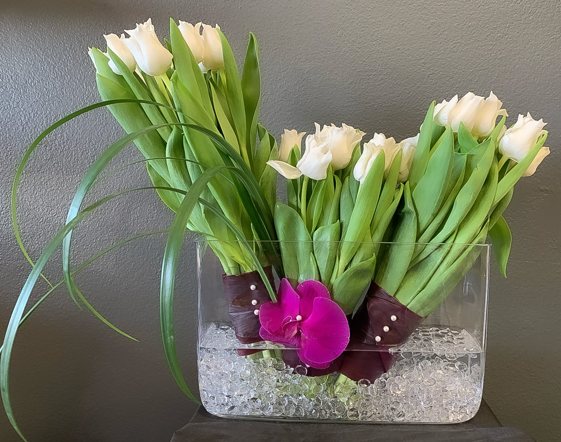 Tulips in modern vase - Standard- Your order will be arranged approximately as shown on our website