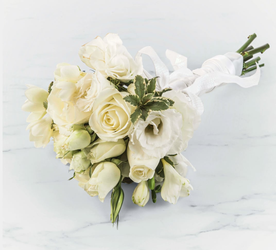 White Rose Bouquet by BloomNation™  - A classic white rose bouquet hand tied with ribbon. The perfect accessory for any formal event including proms, weddings, and debutante balls.  