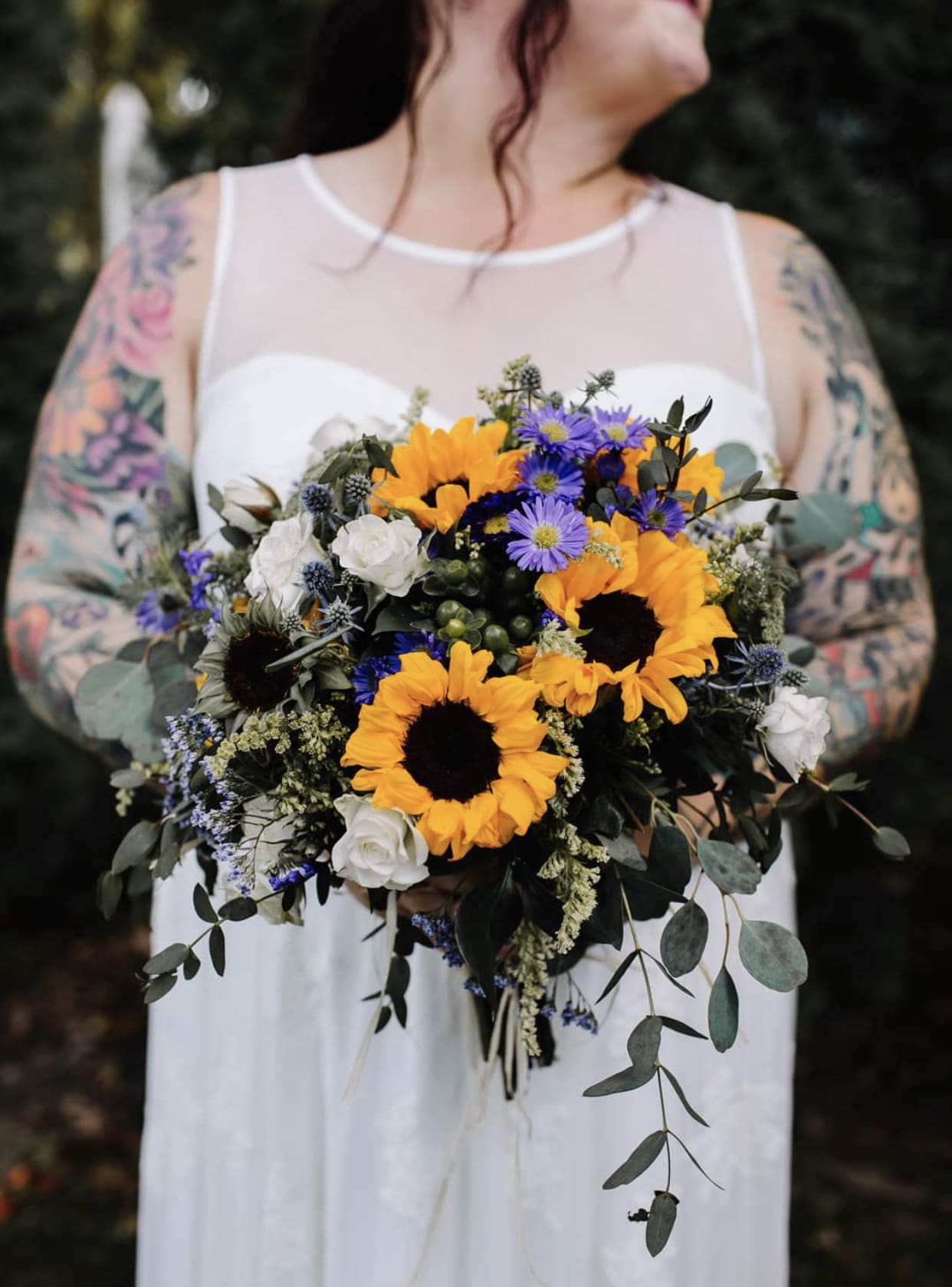 Get me to the barn on time. Get me to the barn on time. - Farm was the setting for this seasonal bridal bouquet. Sunflowers, the farms favorite girl...filled with purple asters, thistles, spray roses. Tied with raffia.