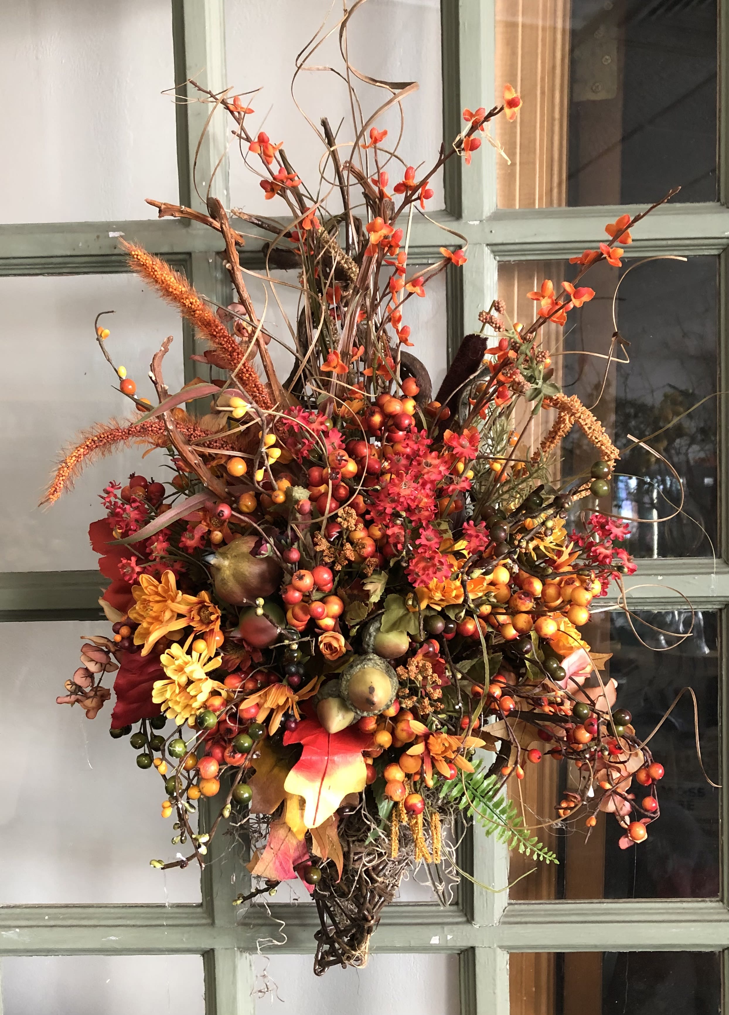 Welcome fall Welcome fall - Orange, Red, Yellow silk flowers fill a cornucopia to hang on your door to welcome family and friends to your beautiful home.