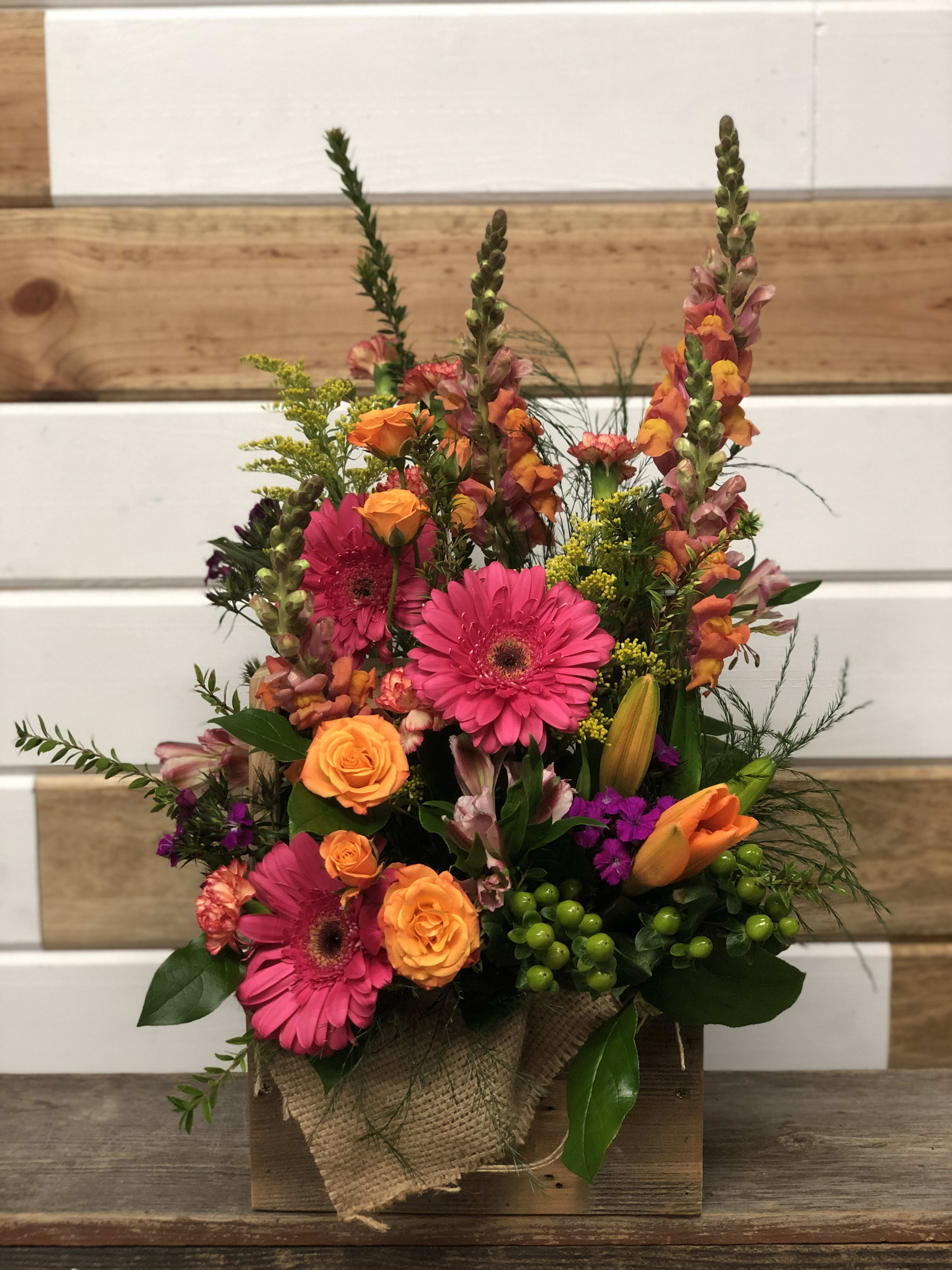 Rustic Bright Box - Fresh Gerbera Daisies, hypericum, spray roses and snapdragons fill this low wood box. This design is one of our favorite signature designs.  Also filling the box is mixed spring California flowers like lilies and dianthus.  Great for any occasion or just because!