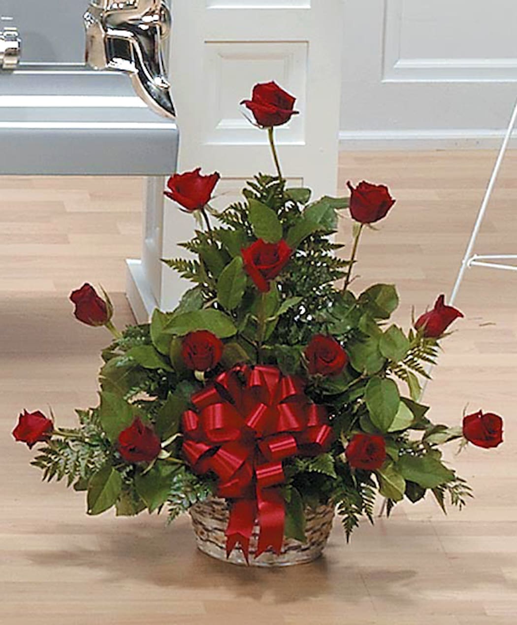 Simple Tribute - A stunning display of roses in red. Other color options may be available and can be requested. 