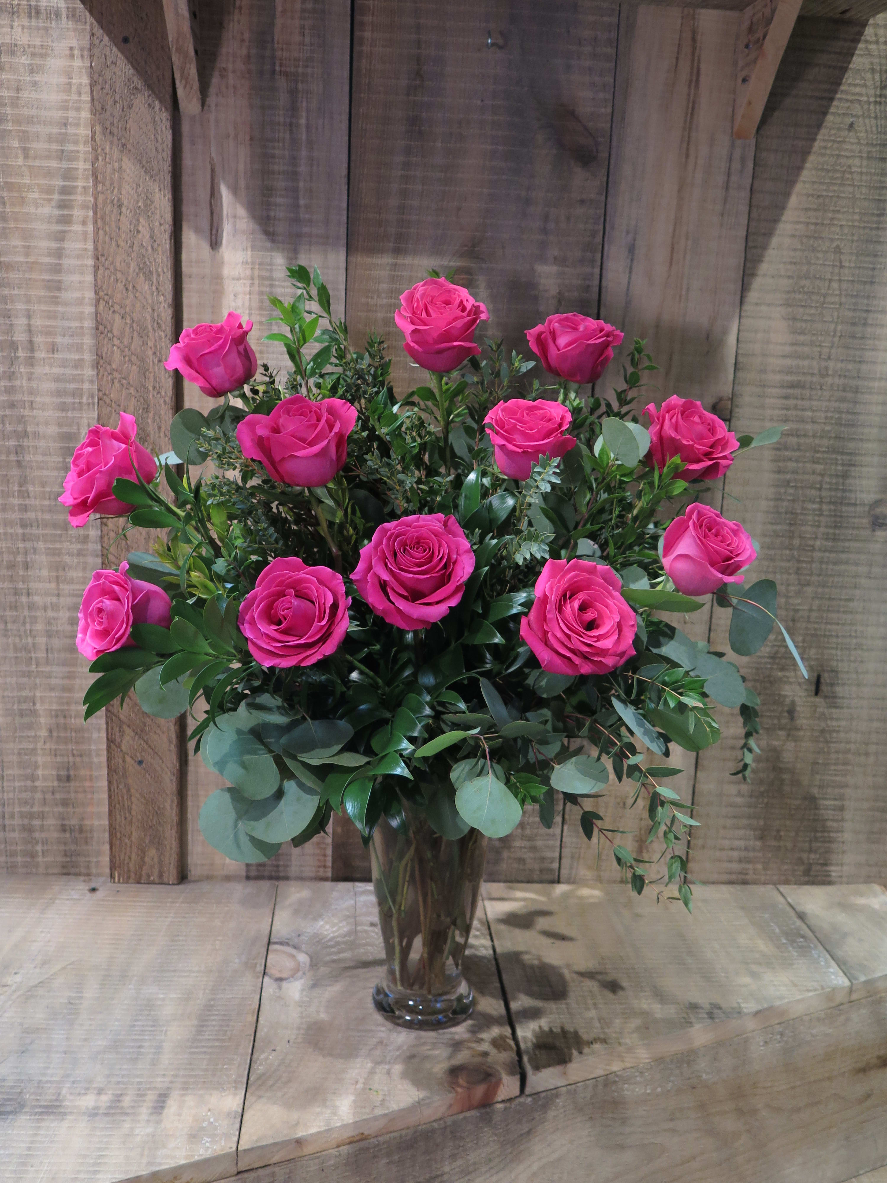 One dozen long stem roses hot pink in Worcester, MA La Jolie Fleur
