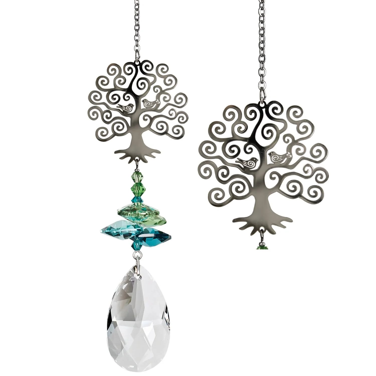 WC Crystal Fantasy Suncatcher - Tree - A large crystal is topped by smaller green crystals and a silver Tree of Life.  This stylized Tree of Life has two birds nestled in its branches. A wide-ranging symbol, the Tree of Life can represent strength, beauty, bounty and redemption, making it an excellent gift for almost any occasion. This Tree of Life tops a cluster of crystals that sparkle and shine in the sun.  Works equally well as a sun catcher or Christmas ornament or hung in an office or dorm room. It's especially beautiful when hanging in the window or in front of a light.  Recommended for indoor use.  This product is handcrafted with pride in the U.K., therefore sizes can vary.  Not boxed, this crystal suncatcher comes ready to give with a sheer organza bag.  Woodstock Crystal Suncatchers — they do for light what our chimes do for sound™ Genuine Austrian crystals Nickel-plated brass ornament Silver finish plated brass chain Overall Length: 4.5 inches [Length: 10'' w/ chain] Individual Item Weight: 0.05 lb. Made in the United Kingdom