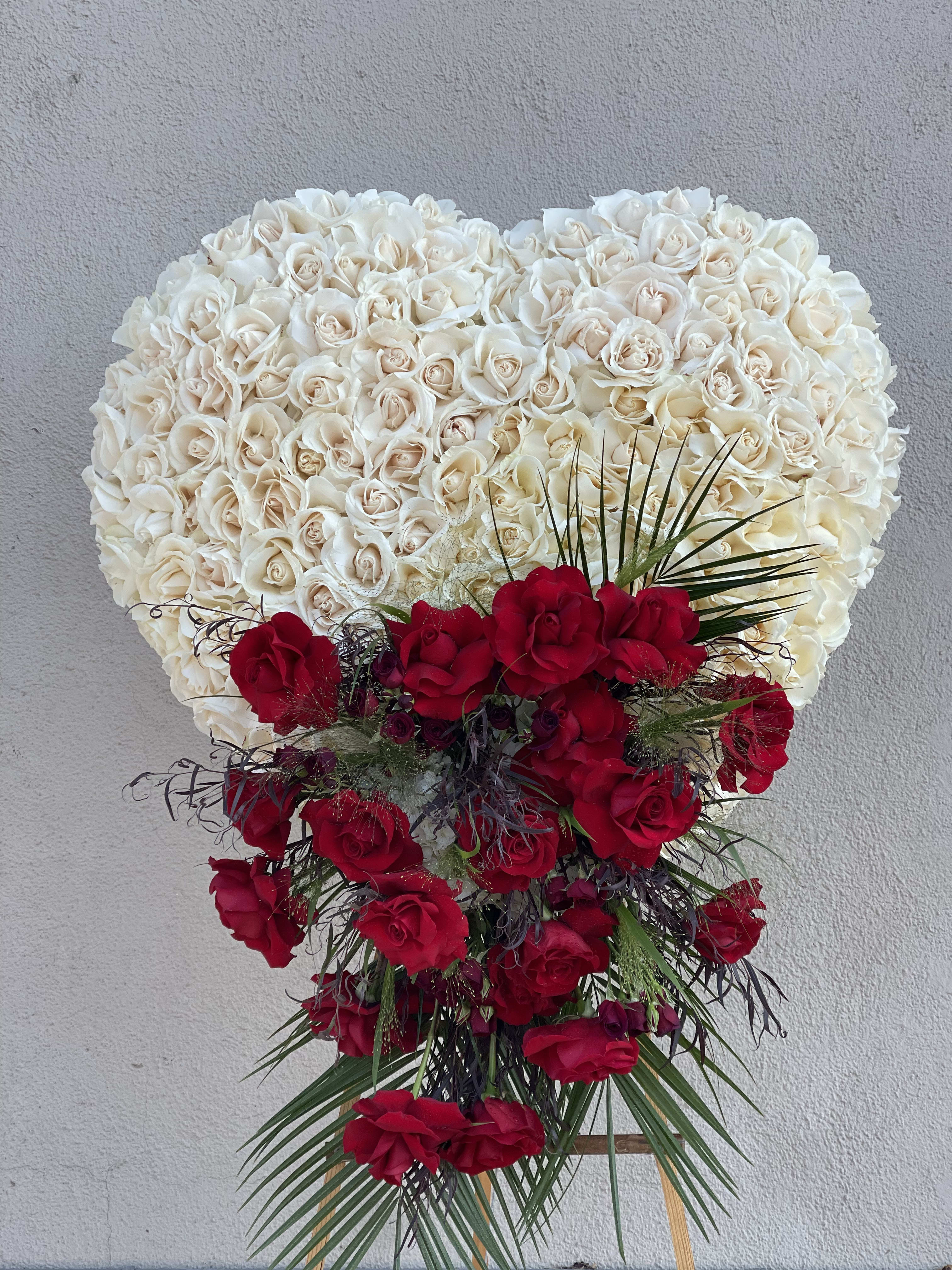 Rest with Love Rest with Love - A gorgeous white heart with roses and cascading red roses