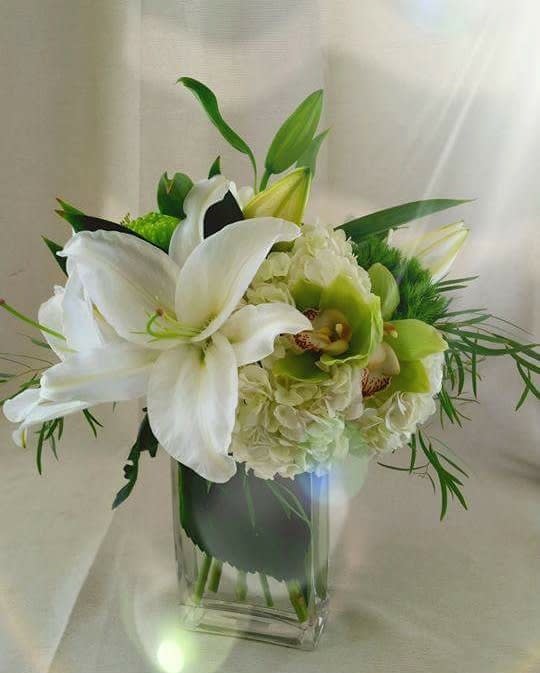 Simple Elegance - The name says it all! Simply an elegant work of floral art.