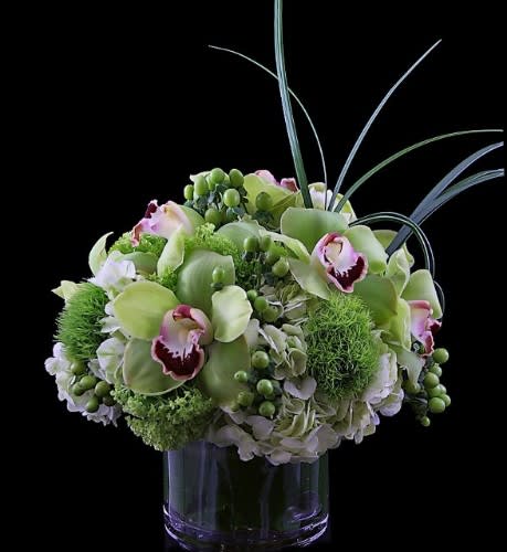 Frida - Orchids, hydrangea mixed with greens and whites to compliment