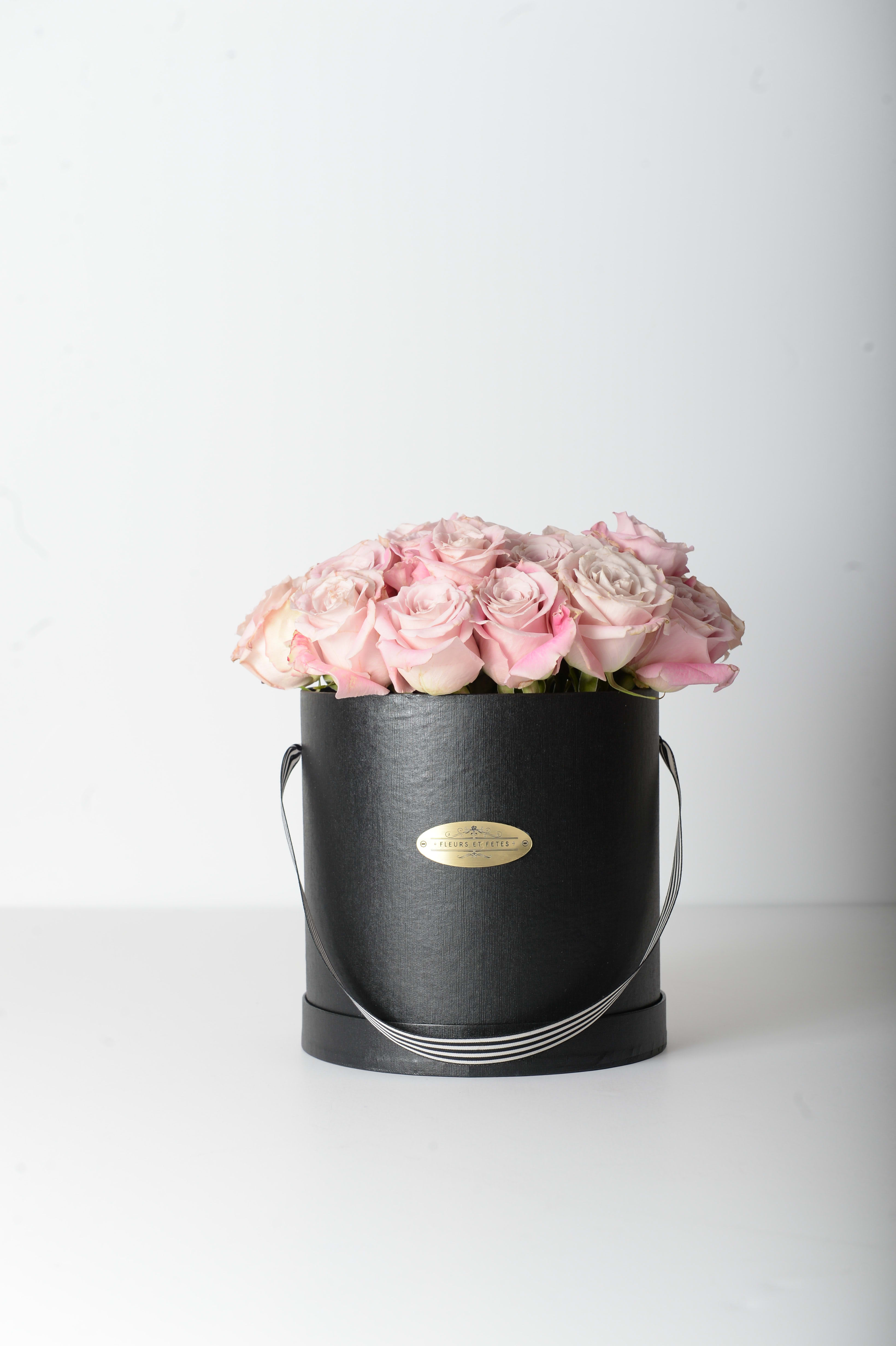 Cupid - Featuring fresh roses. Designed in Fleurs et Fetes box.  *Due to Covid-19, some flowers may not be available. Fleurs et Fetes reserves the right to adjust the flowers and color depending on availability*