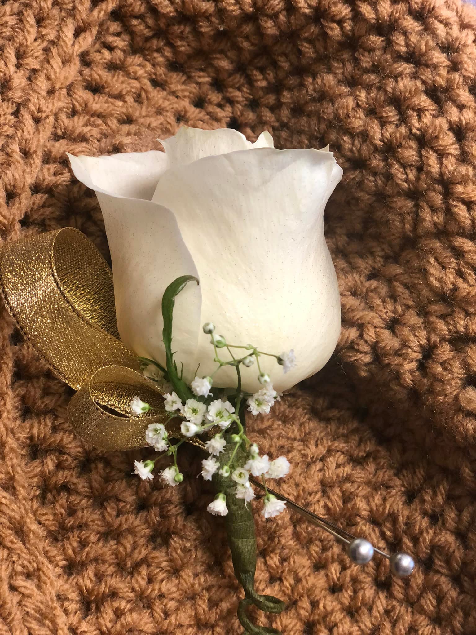 White and Gold Boutonniere  White and Gold Boutonniere  - A White and Gold Boutonniere will add the finishing touch to your evening attire.