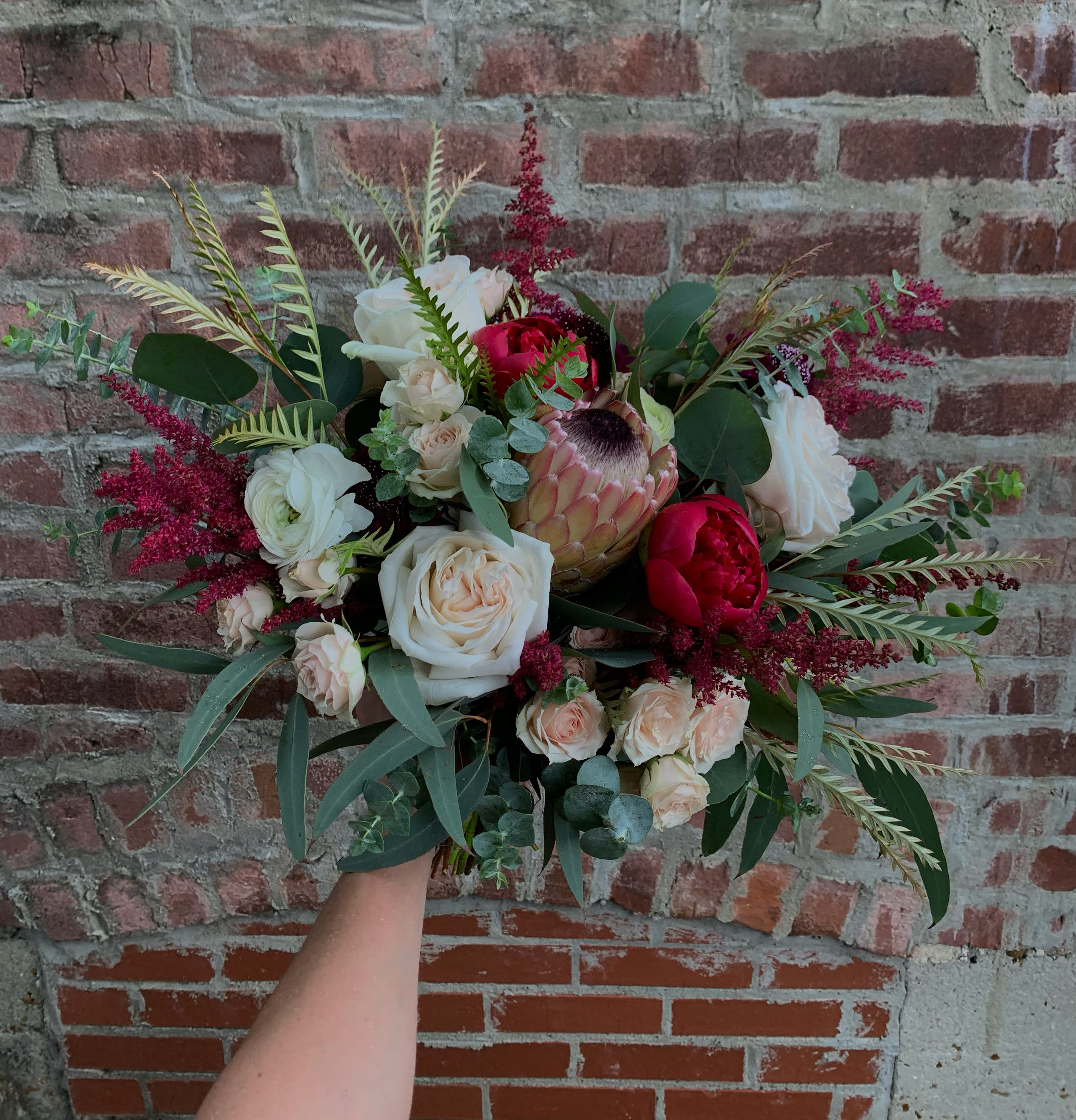 Funky in Fall - This fall design feature a protea with fun textures and premium flowers. Perfect for a gift just because or a unique fall centerpiece!