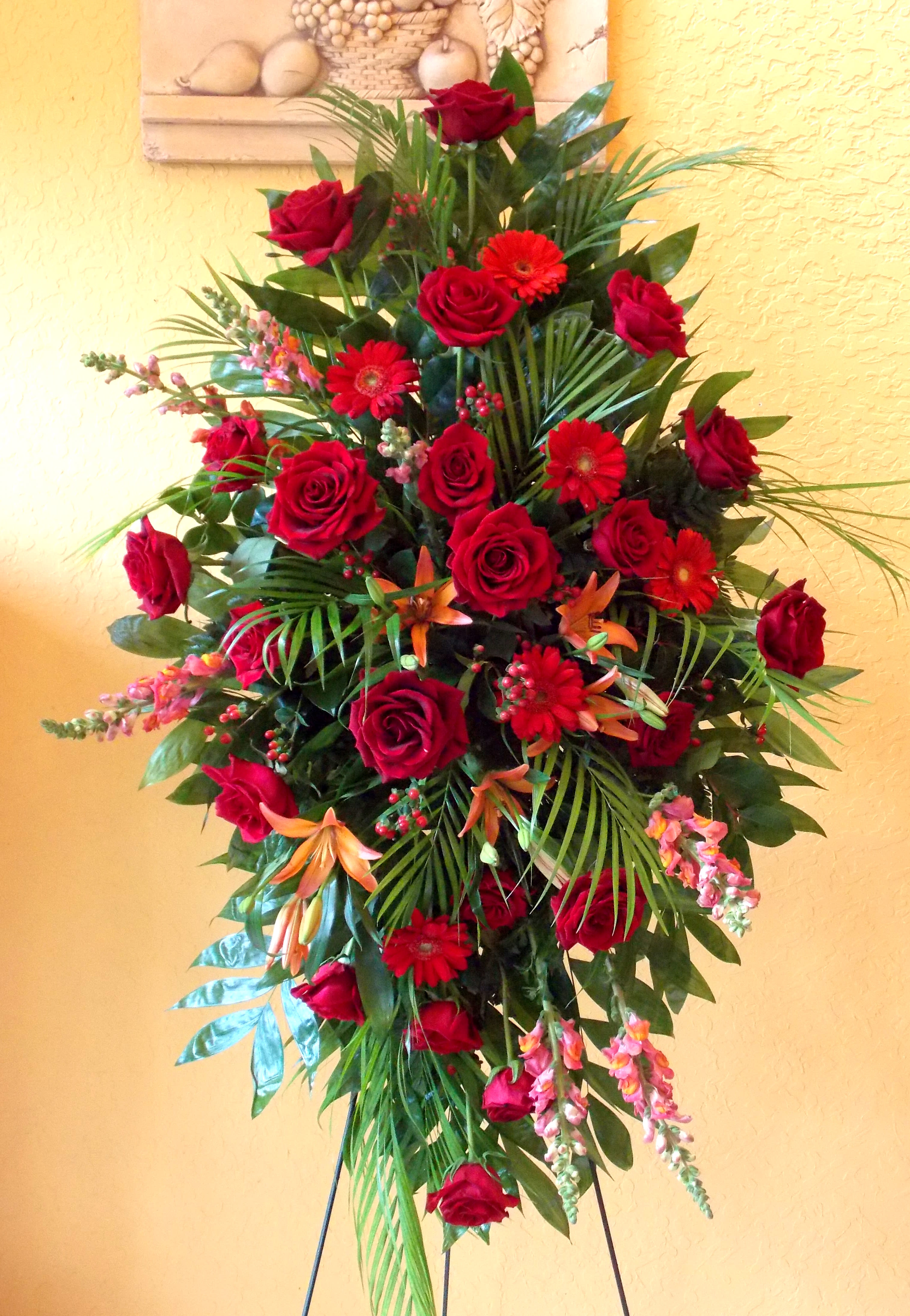 Deepest Sympathy Spray Deepest Sympathy Spray - A beautiful Funeral spray in deep reds and soft pinks.