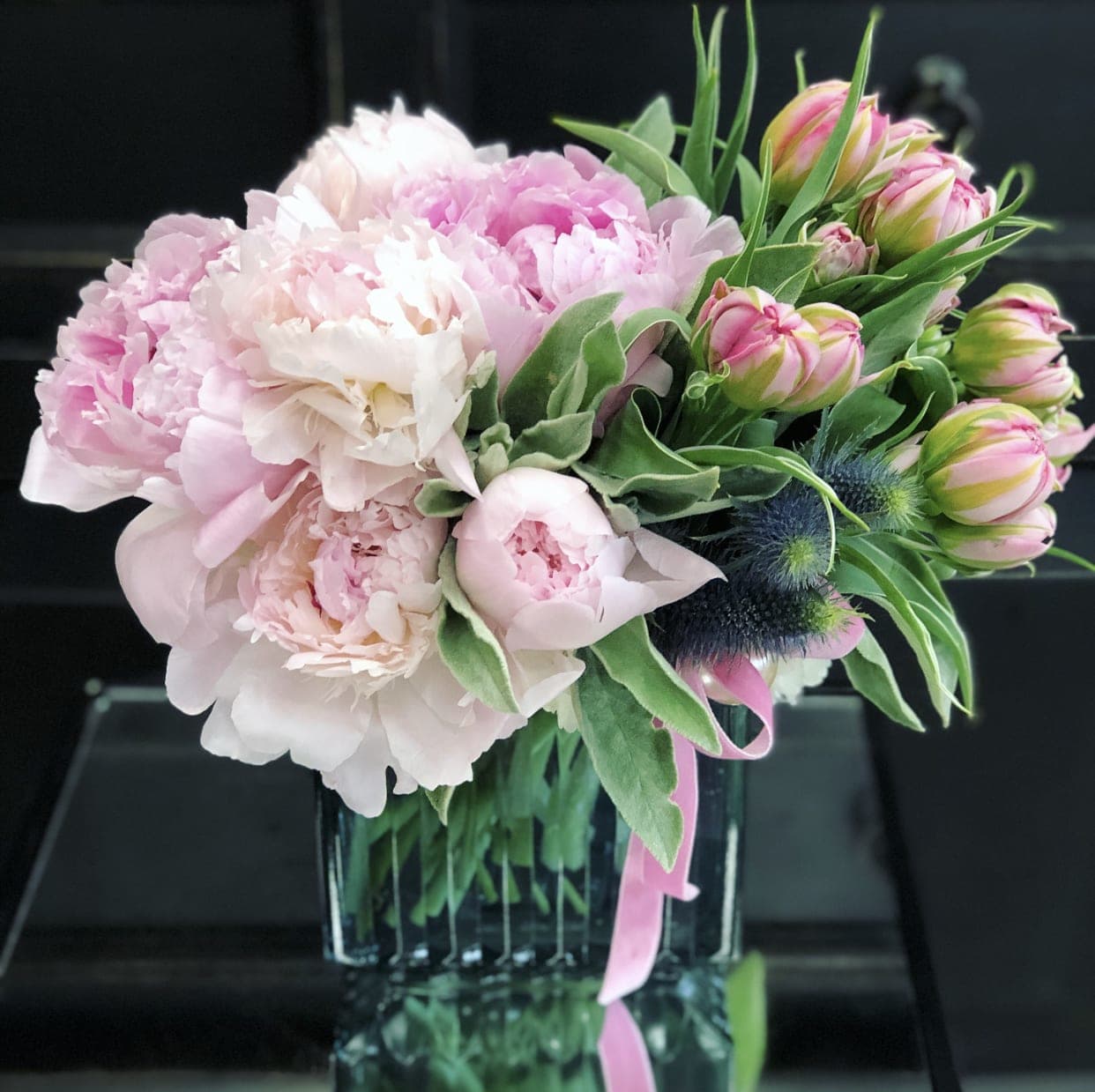 Cancer Awareness! - Believe There Is Hope For A Cure! A cloud of pink peonies in beautiful blue rectangular vase accented with double tulips and beautiful greens. Approximately 15&quot;x15&quot;.  