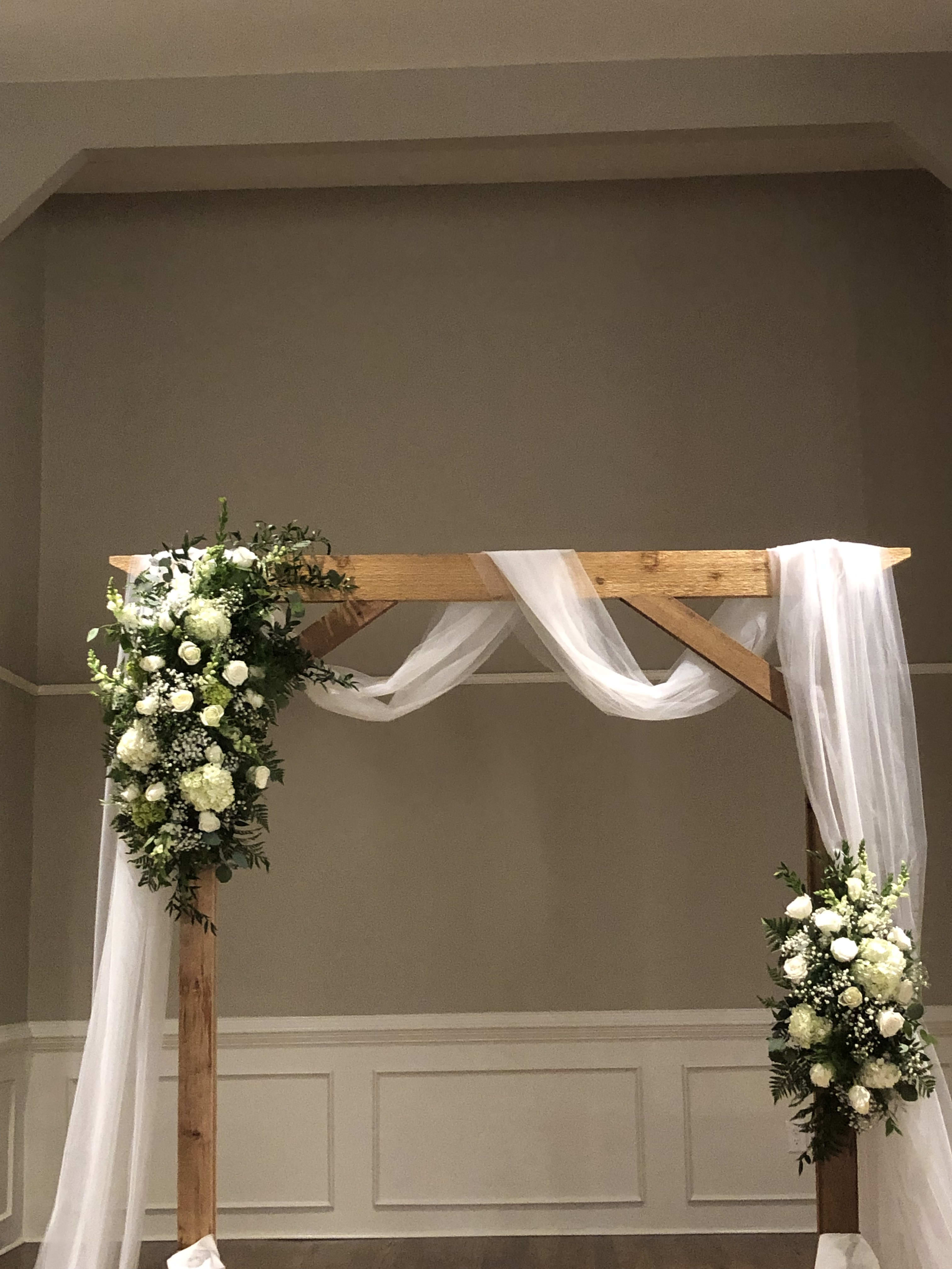 Floral swags for arch - Two floral swags for arch, one small one large , your choice of colors florist choice of flowers. Price does not include installation.