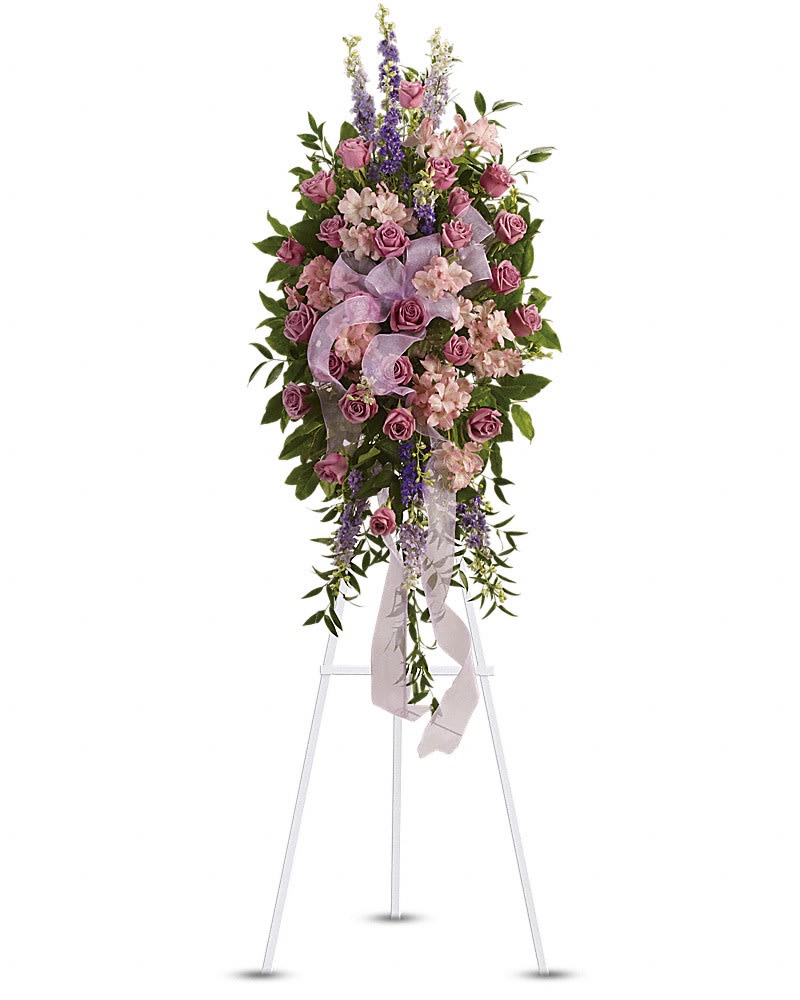 Beautiful Farewell Spray - Utterly feminine this spray is an extraordinarily beautiful way to bid farewell to someone who will remain forever in your heart. A bevy of lovely lavender flowers will soothe souls and deliver strength and hope to those in mourning. Beautiful flowers such as lavender purple and pink blossoms including roses larkspur alstroemeria and more are beautifully arranged. A pretty pink organza ribbon completes this fine farewell.