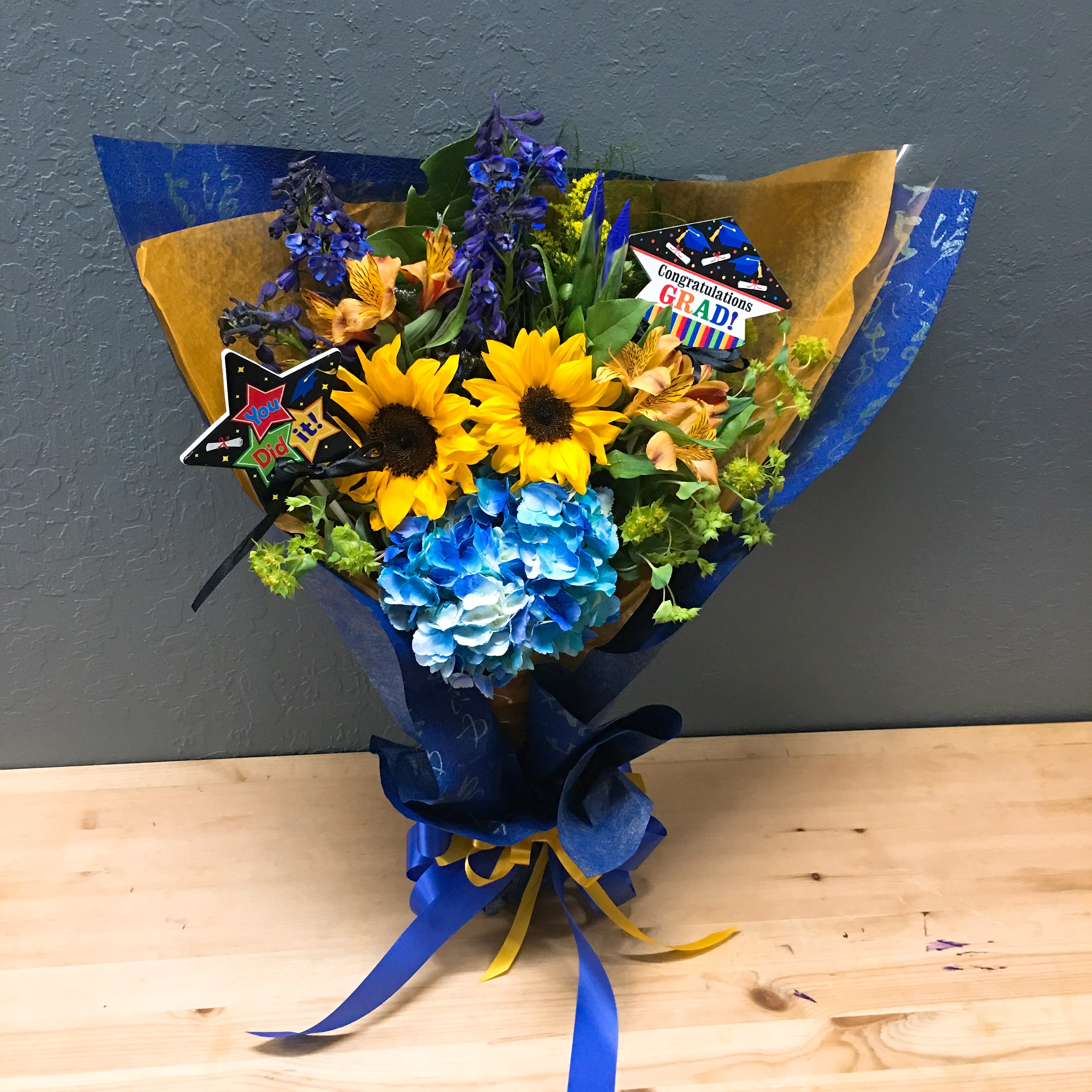 Graduation flowers for boys outlet