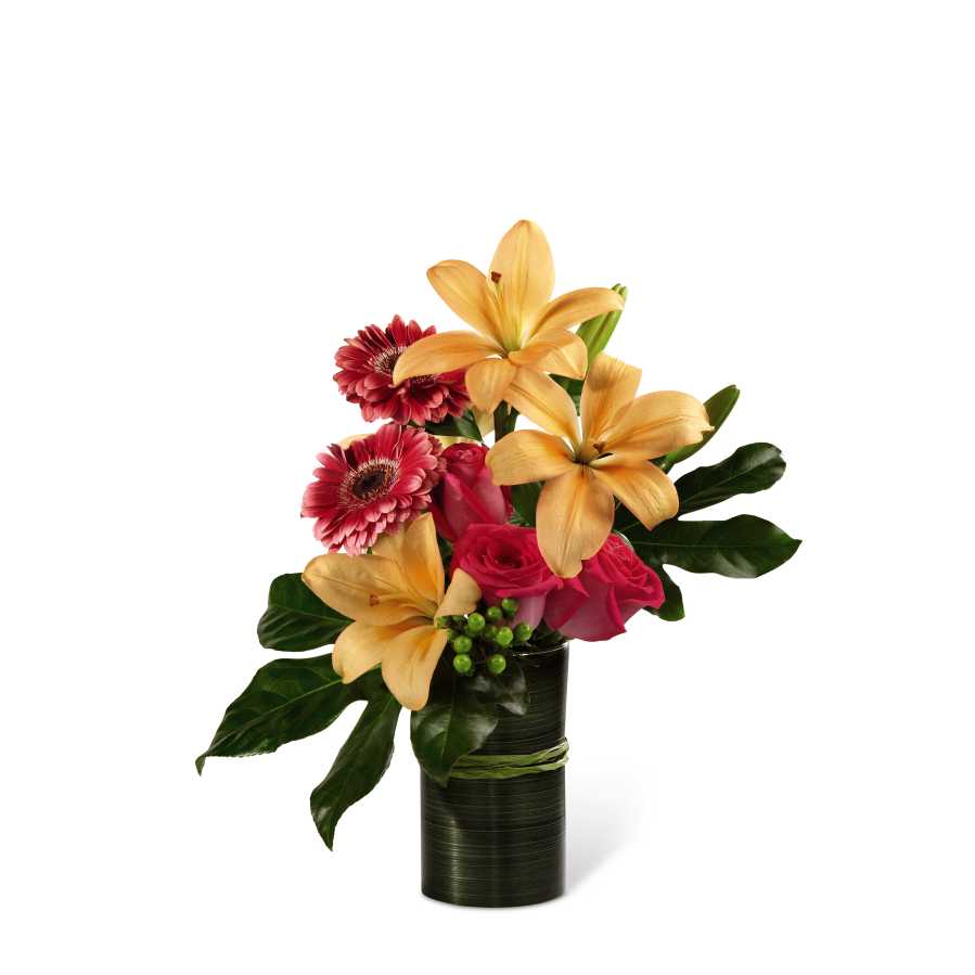 The FTD Sweetness &amp; Light Arrangement - The FTD Sweetness &amp; Light Arrangement is a gorgeous gift set to celebrate any of life's special moments. Hot pink roses and gerbera daisies are bright and beautiful arranged amongst peach Asiatic lilies, green hypericum berries and stunning Fatsia leaves. Presented in a clear glass vase wrapped in a ti green leaf material accented with raffia ribbon, this bouquet blooms with a sweet sophistication to delight your special recipient. GOOD bouquet includes 7 stems. Approx. 17âH x 16âW. BETTER bouquet includes 10 stems. Approx. 19âH x 16âW. BEST bouquet includes 13 stems. Approx. 21âH x 16âW.